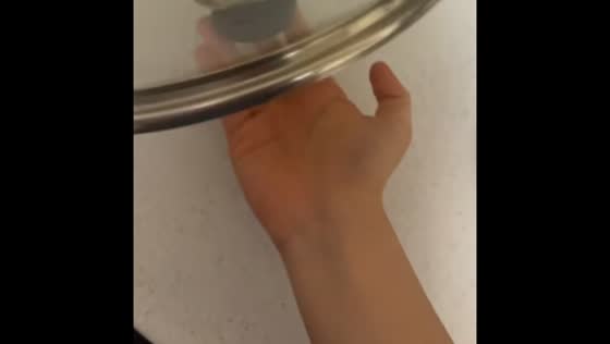 Careful pot lid placement in Incheon, South Korea