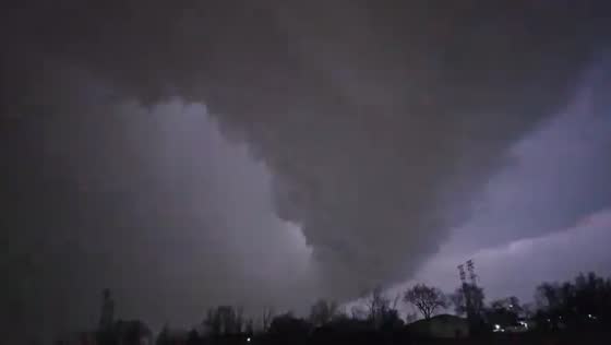 Terrifying tornado strikes Aurora, Illinois, illuminated by lightning