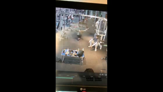 Men use cable crossover machine in unusual way at gym in Henan, China