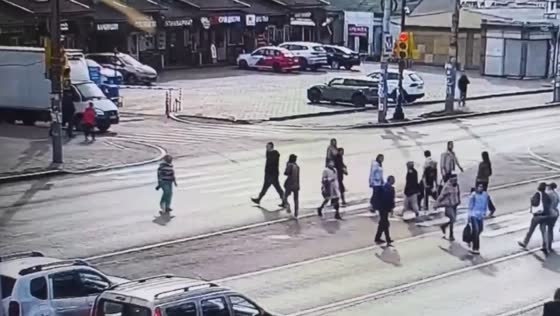 Scooter rider crashes into a pedestrian at a controlled crossing in Ivanovo, Russia