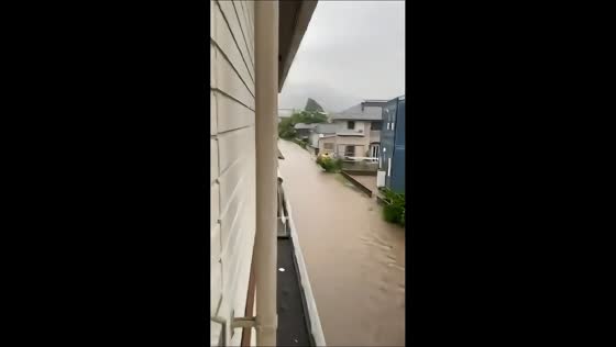 Flash flooding overwhelms roadway in Ashikaga, Japan