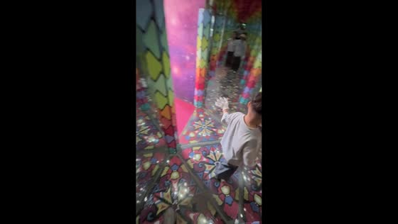 Children collide with mirrors while navigating glass maze in Tianjin, China