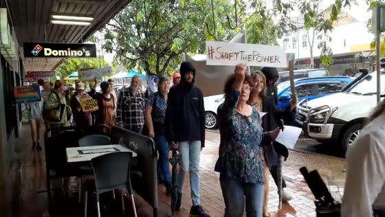 Torrential rally: over 100 brave rain for climate strike in Taree