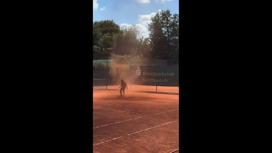 Dust devil spins across tennis court in Freigericht, Germany