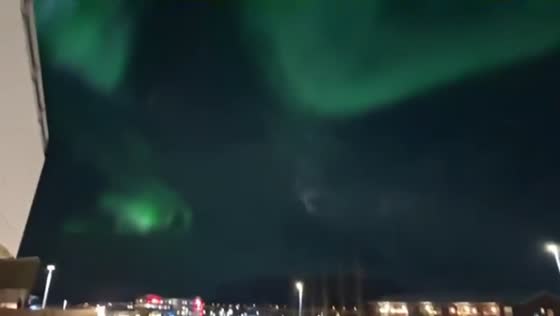 Exceptionally bright aurora borealis lights up the night sky in Reykjavik, Iceland