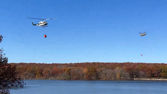 Helicopters battle wildfire in Connecticut for third consecutive day
