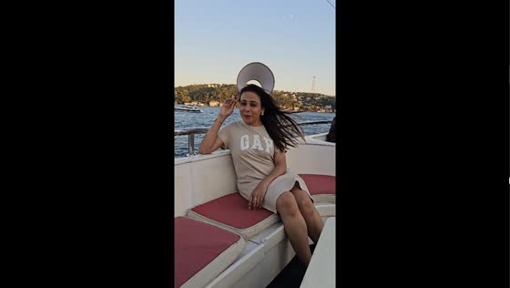 Hat blown away on a boat in Istanbul