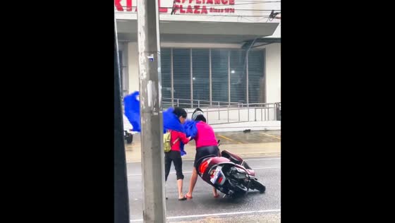Motorbike toppled by strong winds in Bacolod, Negros Occidental, Philippines