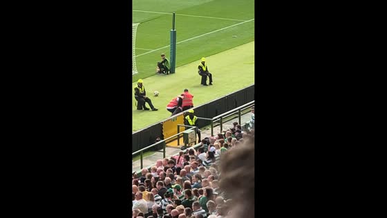 Pitch invaders disrupt Celtic vs Manchester United match in Glasgow, UK