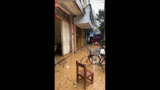 Street remains covered in mud after severe flooding in Fujian, China