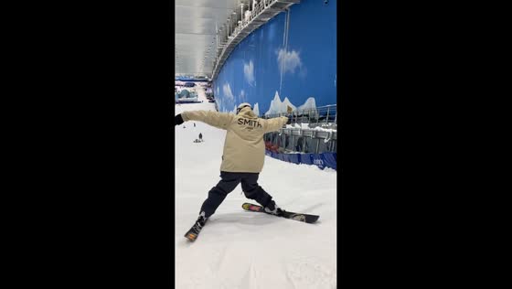Skier loses control and crashes into wall on indoor slope in Hebei, China