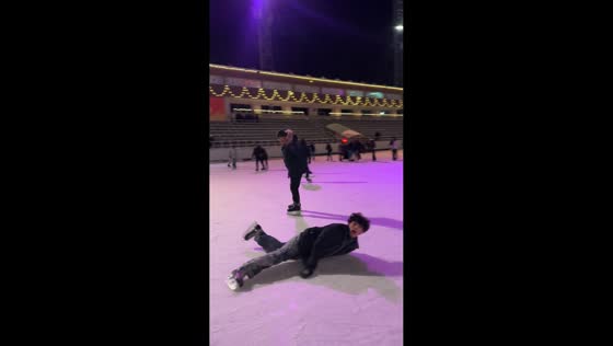 Skater falls while ice-skating in Almaty, Kazakhstan