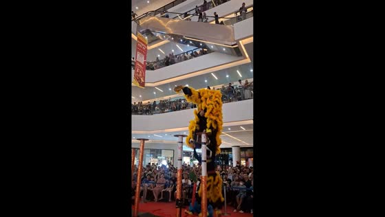 Lion dance performers fall from poles during celebration in Tangerang, Indonesia
