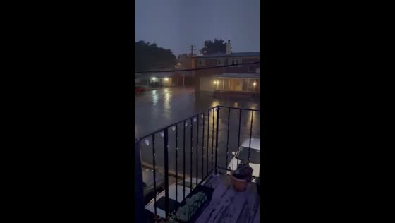 Night rain shower with lightning flashes in Milwaukee, Wisconsin