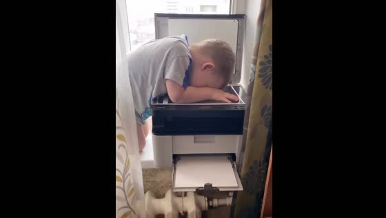 Toddler learns to use printer and makes photocopies of himself in Yuryuzan, Russia