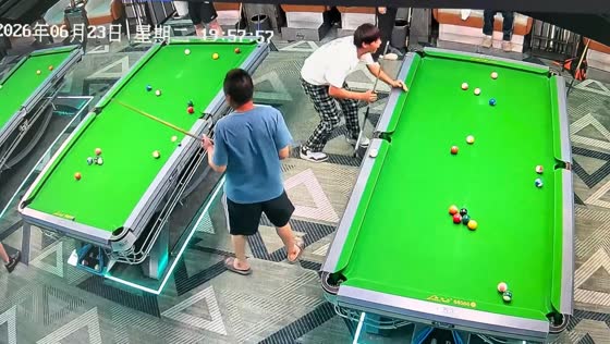 Billiard player's pocket catches flying cue ball in Shanghai, China