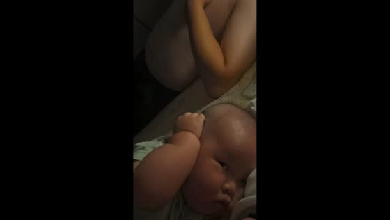Baby struggles to sleep beside loudly snoring father in Shanxi, China