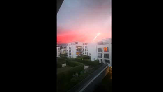 Thunderstorm in Germany captured with unusual red hue in Sky