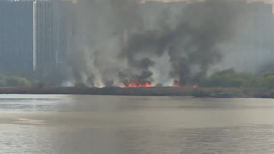 Large fire sends massive smoke plume over downtown Changsha in Changsha, Hunan, China