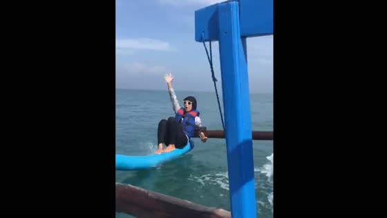 Friend falls from boat wing during ride at Pangandaran Beach, Indonesia