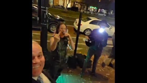 Protesters blast music and strobe lights outside dinner event in Washington, D.C., USA