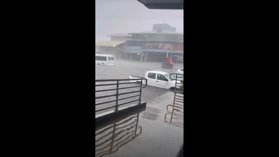 Flash flood leaves debris and damaged cars in Hervey Bay, Australia