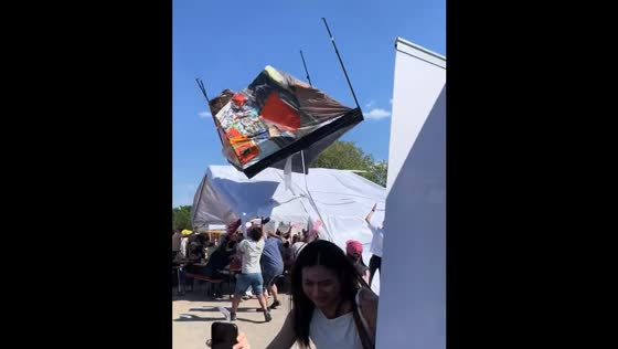 Tent blown away by wind nearly hits people in Germany
