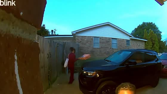 Woman startled by raccoon at the parking garage in Southaven, USA