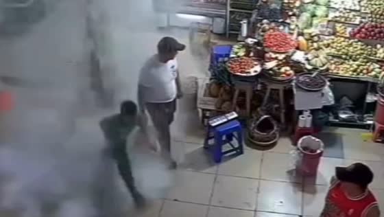 Child falls while avoiding debris in store, CCTV footage captures incident