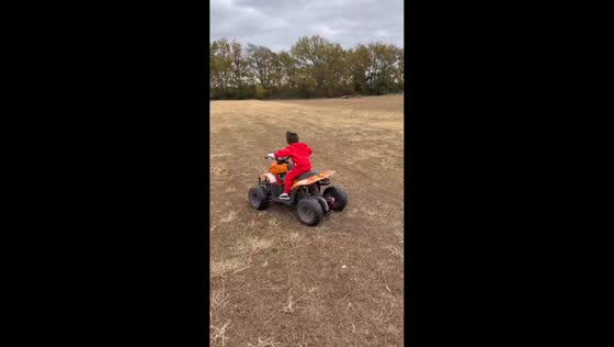 Young boy rides ATV during winter fun in Broken Arrow, USA