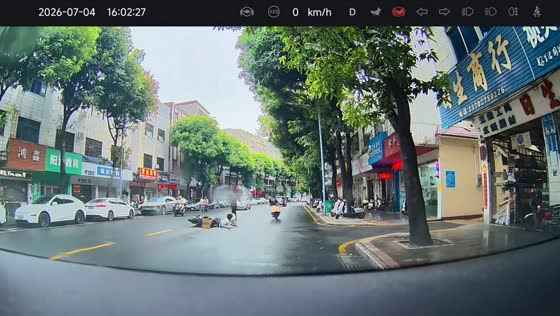 Pedestrian narrowly avoids sliding motorcycle in Guangdong, China
