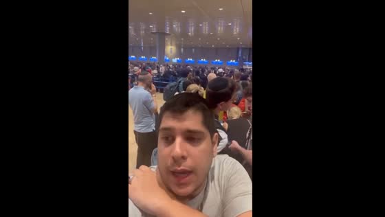 Tel Aviv Ben Gurion Airport: passengers await flights amidst delays caused by recent attacks in Israel