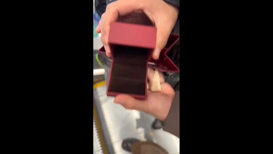Gold earrings slip into moving escalator in Shandong, China