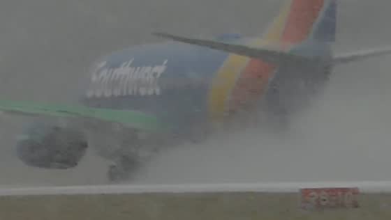 Heavy snowfall during aircraft takeoff at Rochester International Airport