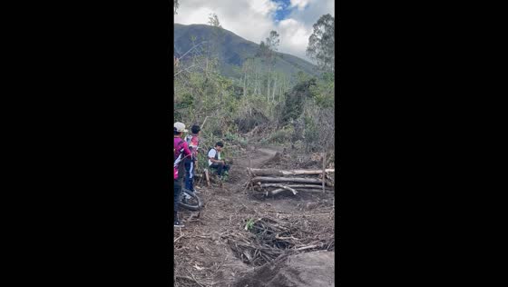 Mountain biker falls after losing balance on a wooden ramp in Atuntaqui, Ecuador