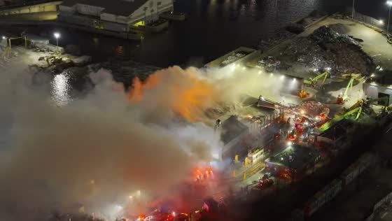 Fire erupts at recycling facility in Queens, New York, USA