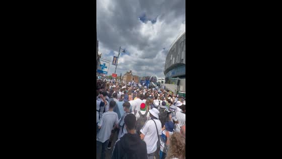 Fans celebrate Tottenham Hotspur trophy parade in London, England