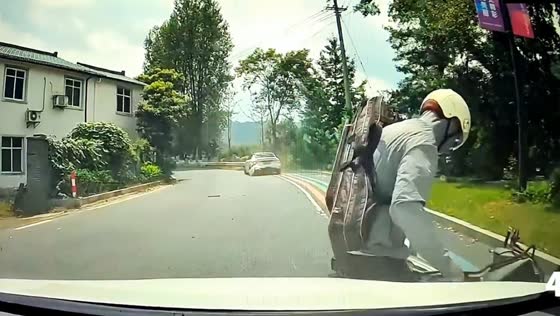 Motorcycle collision caught on camera in Chongqing, China