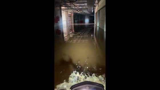 Floodwaters invade Beira Rio Stadium hallways in Porto Alegre amid severe rainfall