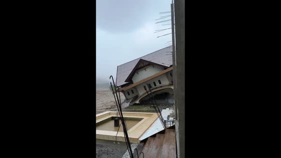 House swept away by powerful cyclone-triggered flood in Samalanga, Indonesia