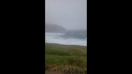 Stormy seas and strong winds at Coumeenoole Beach in Dingle, Ireland