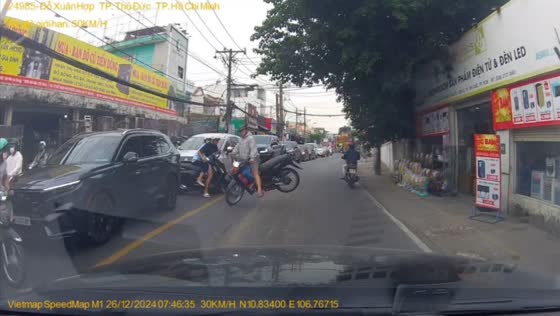 Motorcycle collision captured on dashcam in Ho Chi Minh, Vietnam