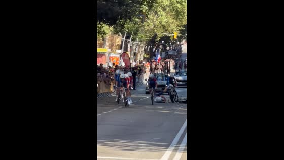 Two cycling teams crash at same corner during Tour de France stage in Barcelona, Spain