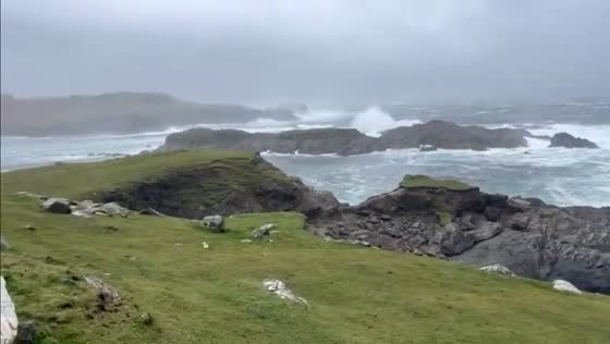 Strong winds and crashing waves along Atlantic Drive in Achill Island, County Mayo, Ireland