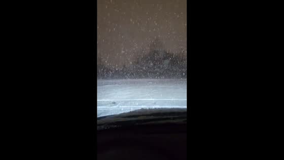 Hazardous nighttime driving as lake-effect snow slashes visibility in Pennsylvania, USA