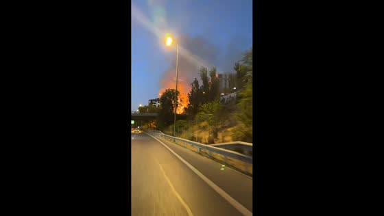 Roadside fire sends smoke over M-30 highway in Madrid, Spain