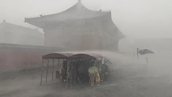 Torrential rainstorm engulfs Temple of Heaven in Beijing, China