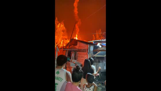 Flare sparks small fire during New Year celebration in Cavite, Philippines