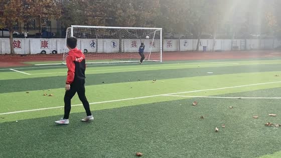 Ball hits post and keeper's head in Hebei Province, China