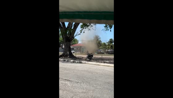 Whirling spinning wind narrowly spares parked motorbike in North Cotabato, Philippines